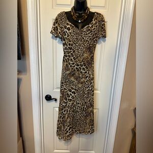 D11-Pretty Leopard Print V-Neck Dress w/split flutter sleeves w/asymmetric hem.